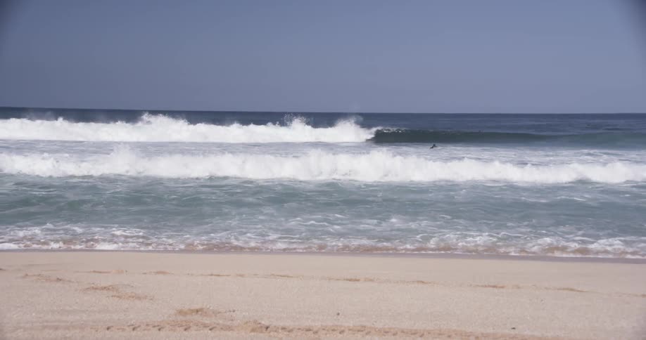 A person is rising a wave in