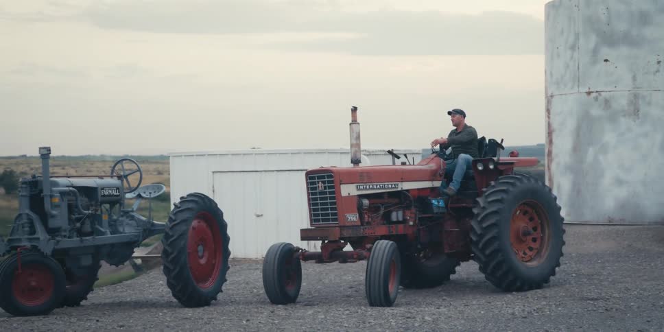 A clip of a person driving a tractor