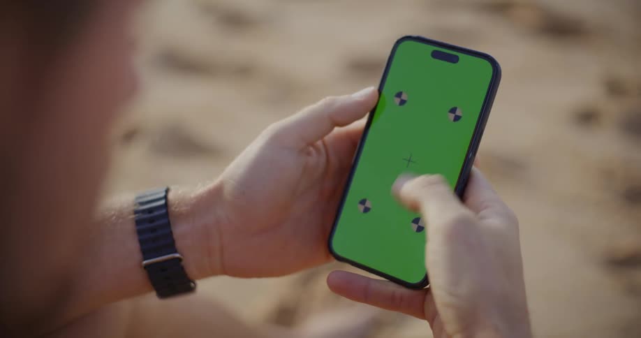 Pair of hands typing on a smartphone