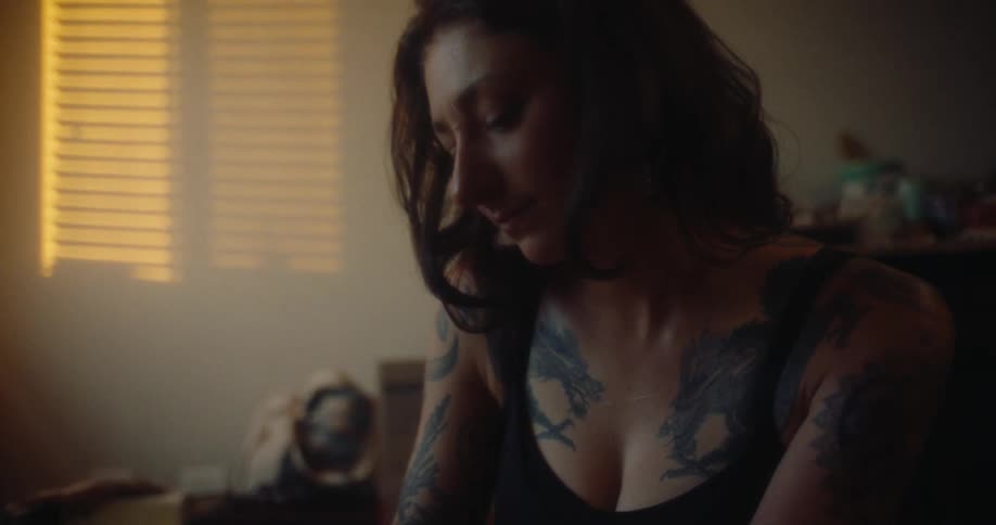 Emotional woman looking at a photograph
