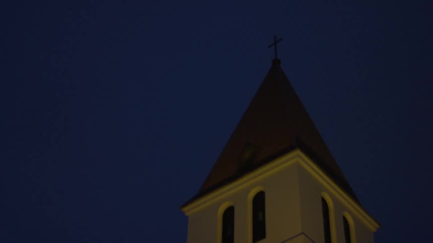 Steeple of a church at night