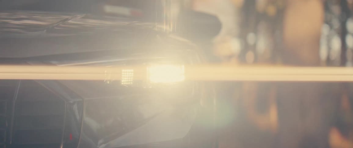 The headlight on the vehicle turns on