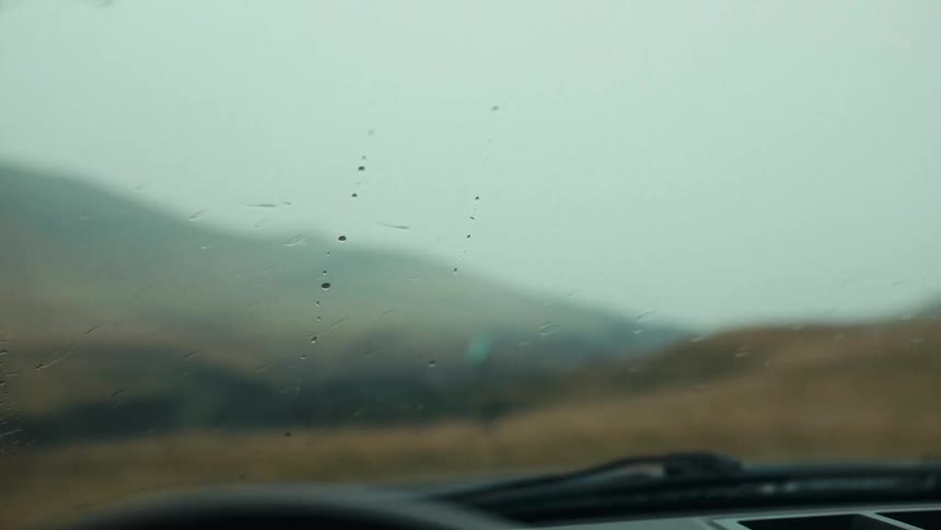 Active windshield wiper on a rainy day
