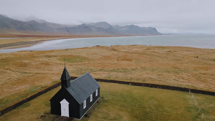 A lone church sits in a field