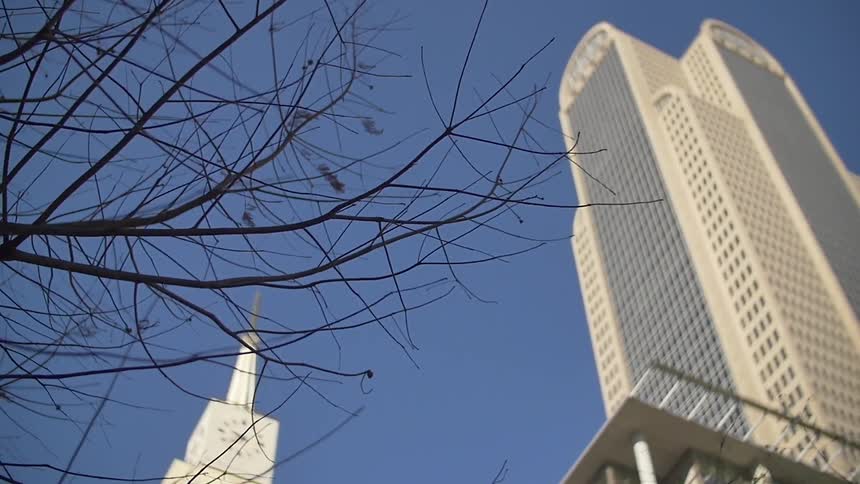 City skyscrapers tower overhead