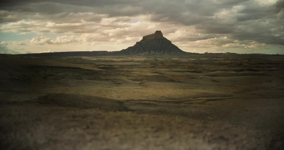 Heavy clouds are over the desert landscape