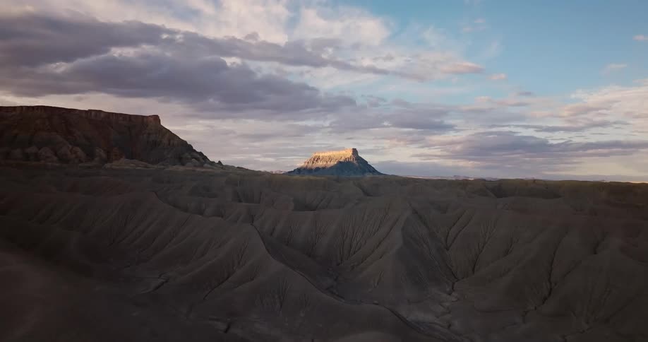 Landscape of mountain cliffs with canyons on the horizon