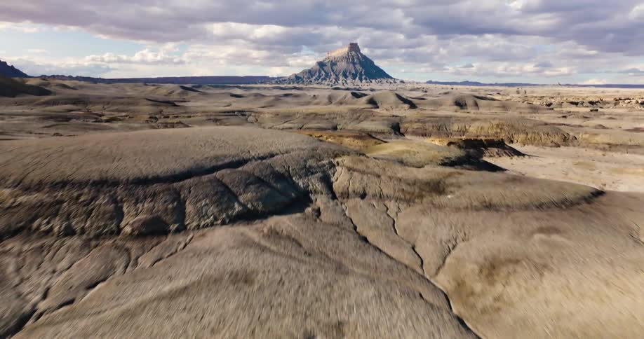 Aerial panorama of a rocky landscape with a mountain on the horizon