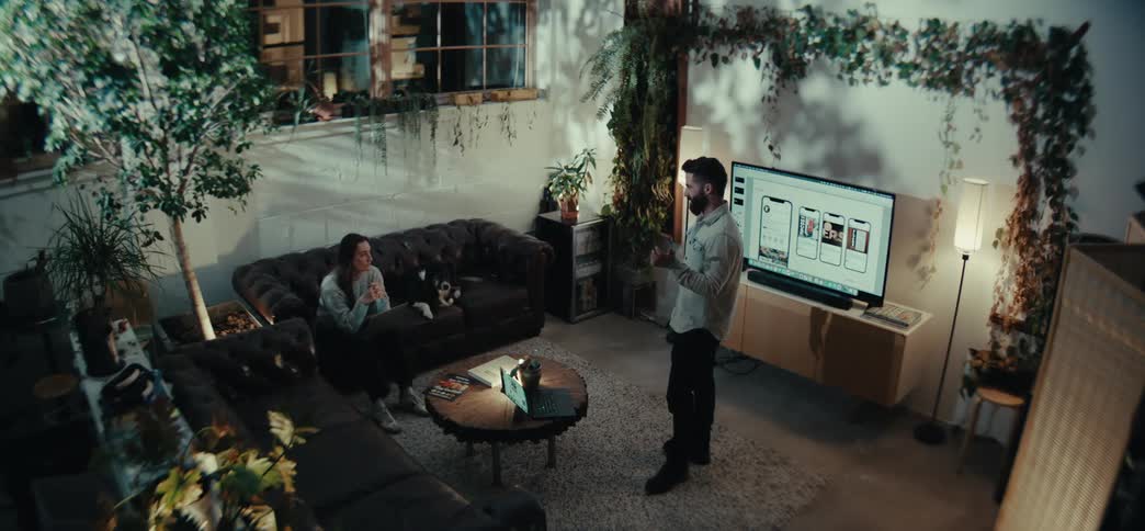 A footage of a man and a woman having a conversation indoor