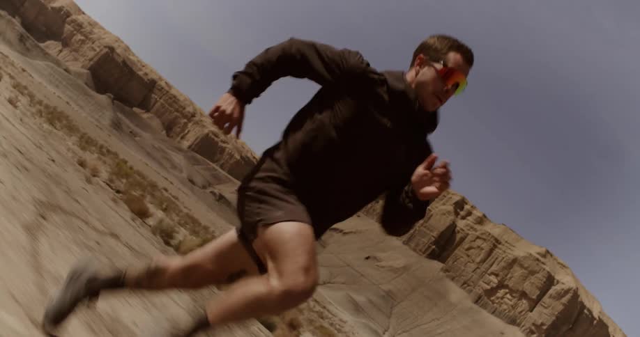 A man is racing in the desert