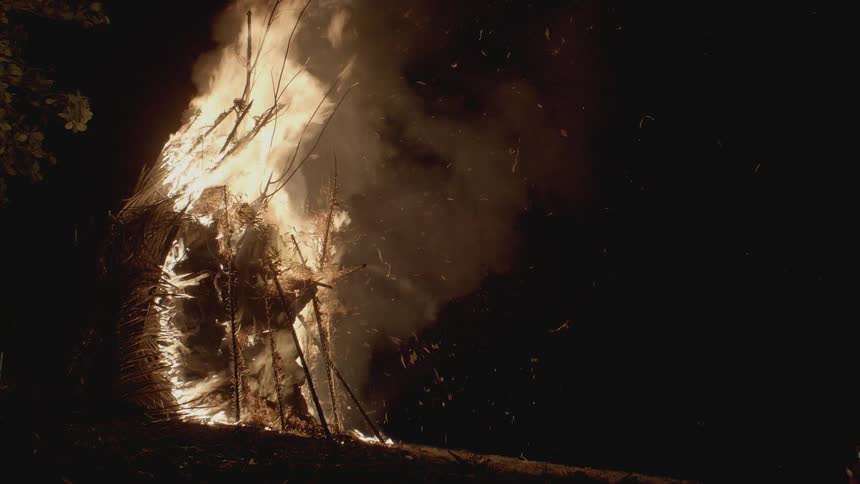 Controlled bonfire burning at night