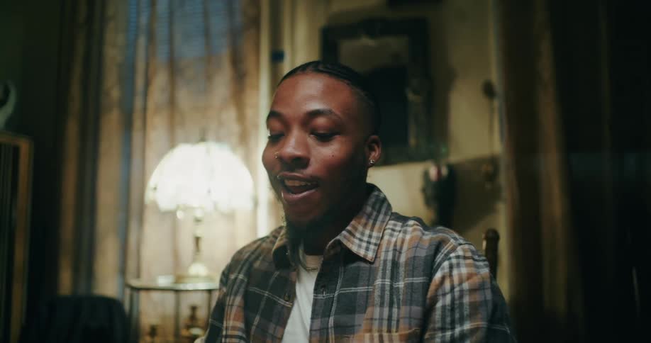 A clip of a black male smiling