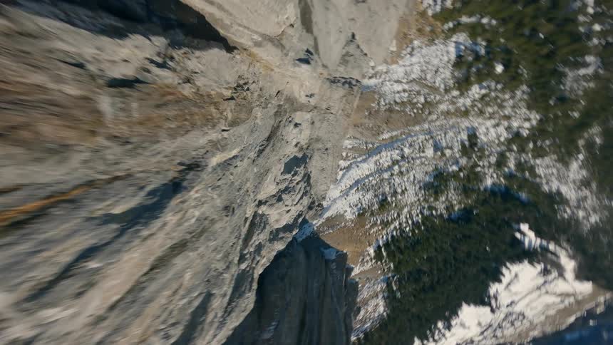 Drone shot of a mountain with a very steep cliff