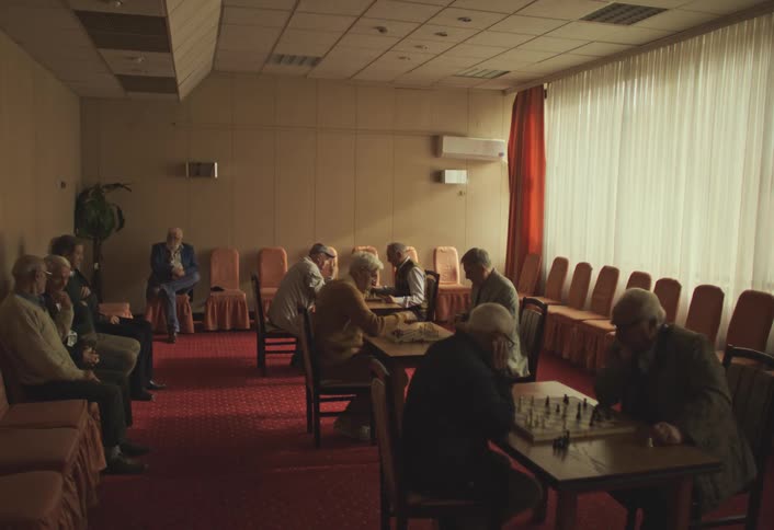 A footage of people playing chess