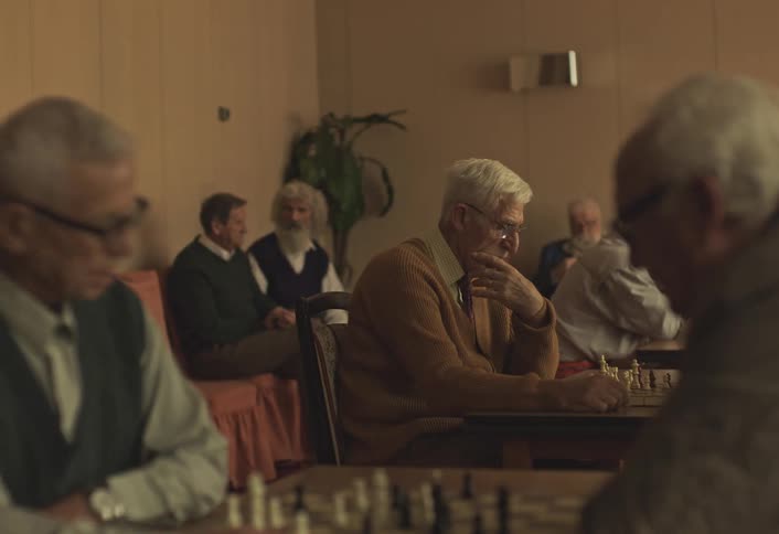 A footage of people playing chess game
