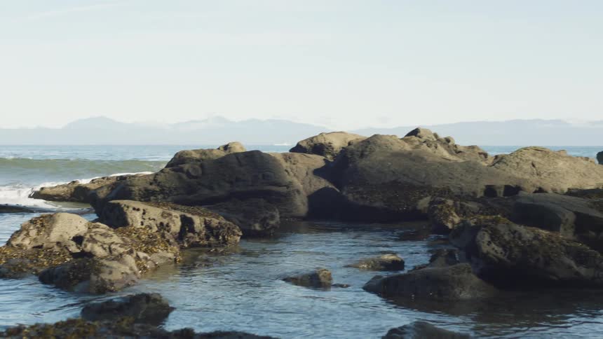 Waves crashing on rocks in the sea