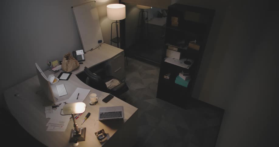 A clip of a person walking out of the office