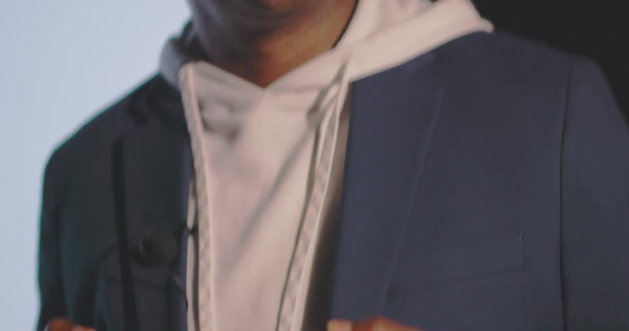 Portrait of a man walking and talking