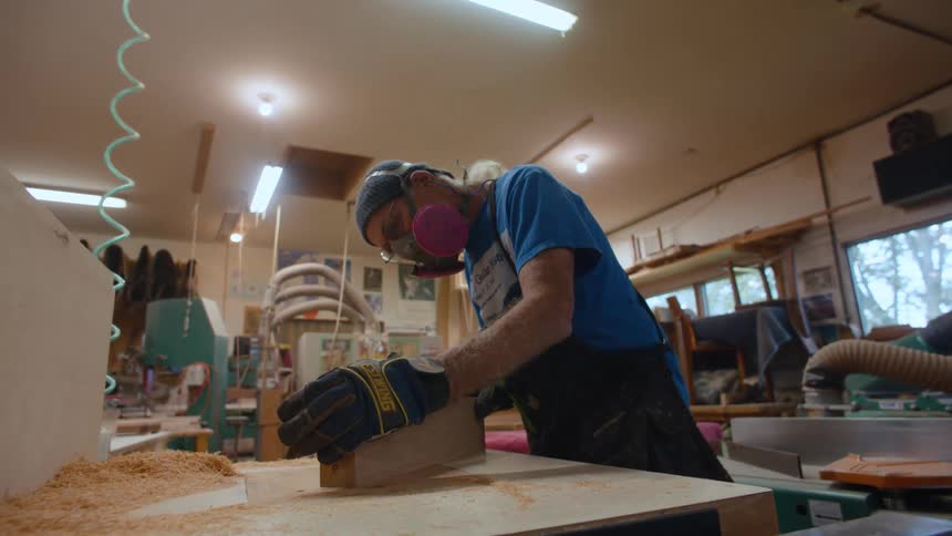 Carpenter working on a piece of wood