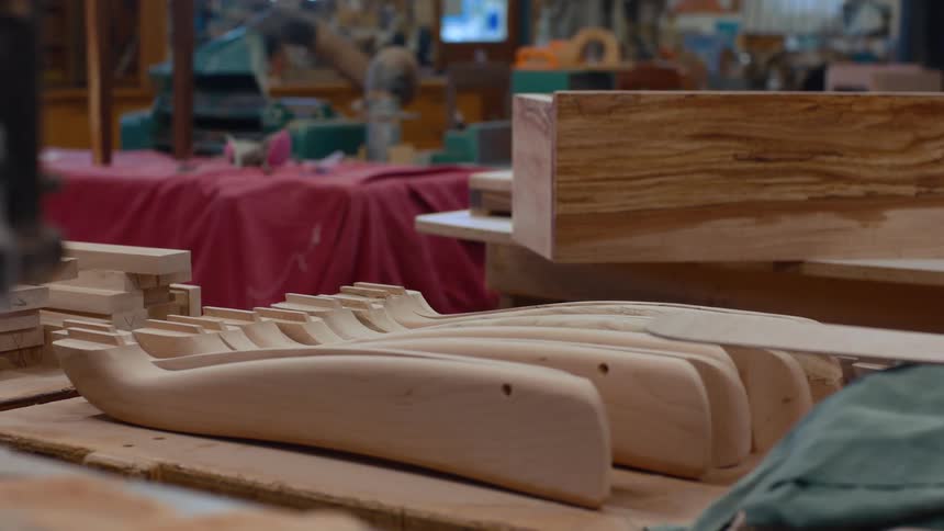 Close up of carpenters wood pieces on top of a table