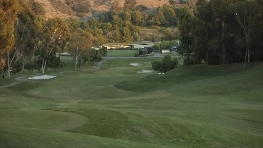 A golf course sits undisturbed