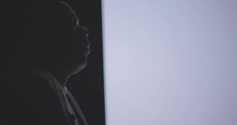 A footage of a man walking out to the stage
