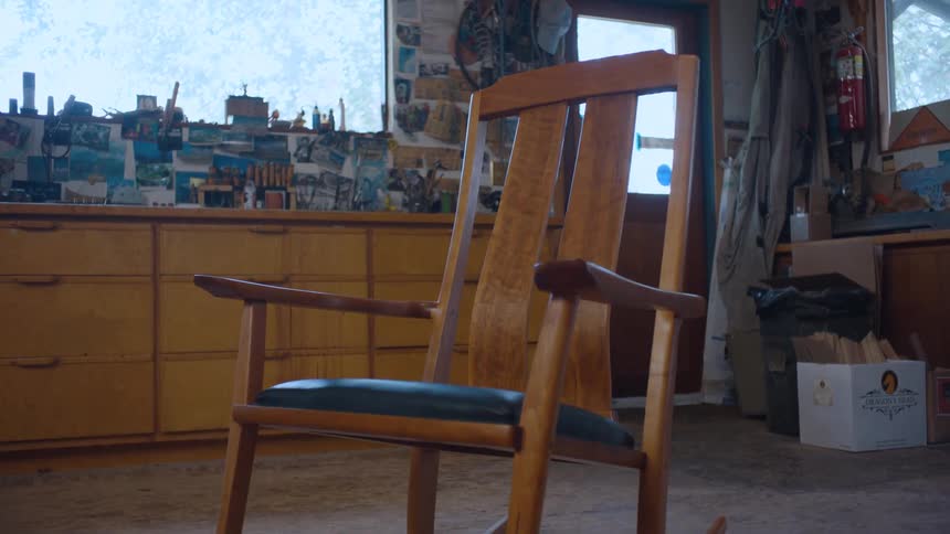 Approaching a wooden rocking chair