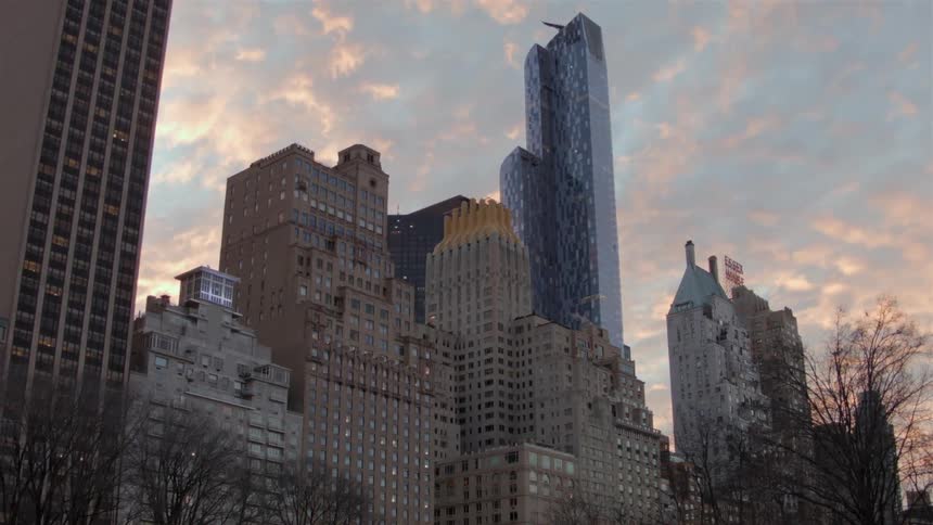 A view of city buildings on a cloudy day