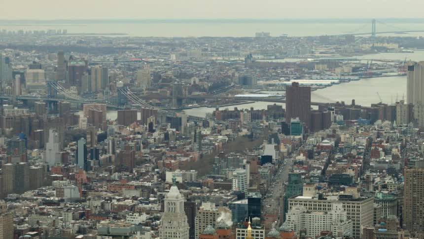 City buildings and skyscrapers are shown in the distance