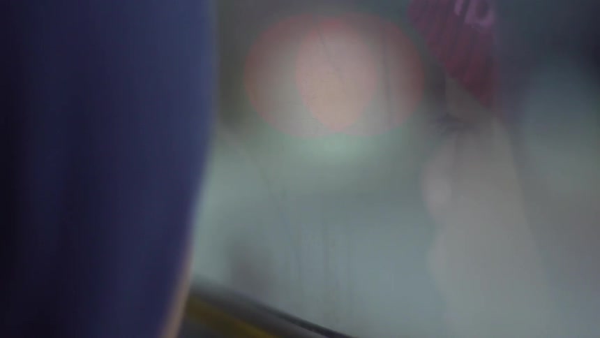 Reflection of a child in a window