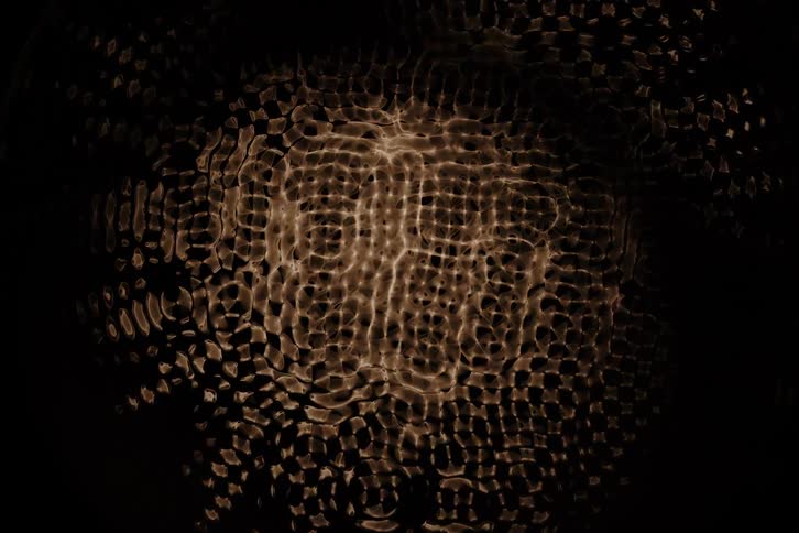 Close up of liquid with abstract moving lighting
