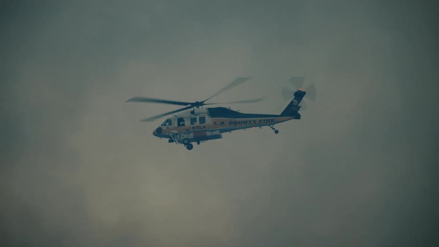 Helicopter flying over the sky