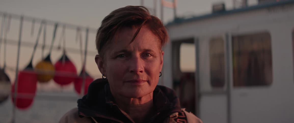 Portrait of a woman on a fishing boat