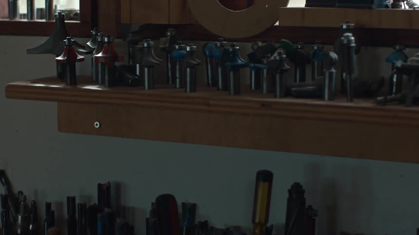 Many tools sit on a shelf