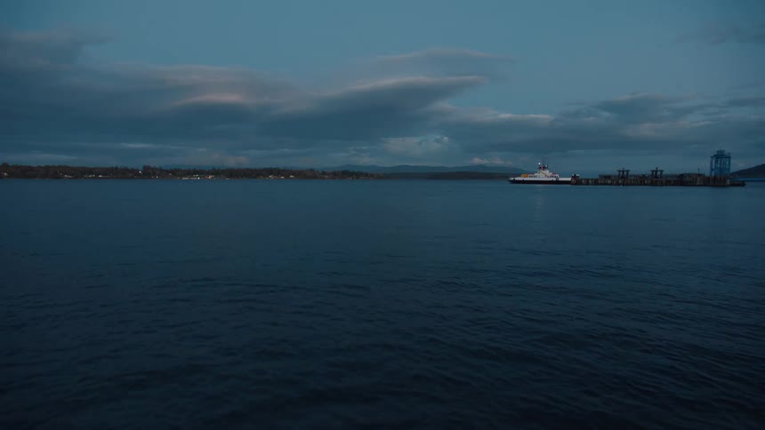Ocean landscape with a moving boat on the horizon