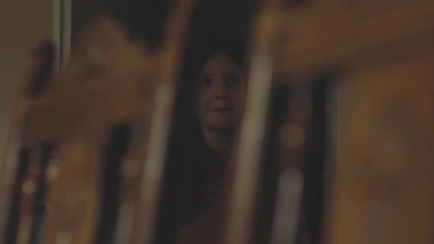 Two children entering a room in the house