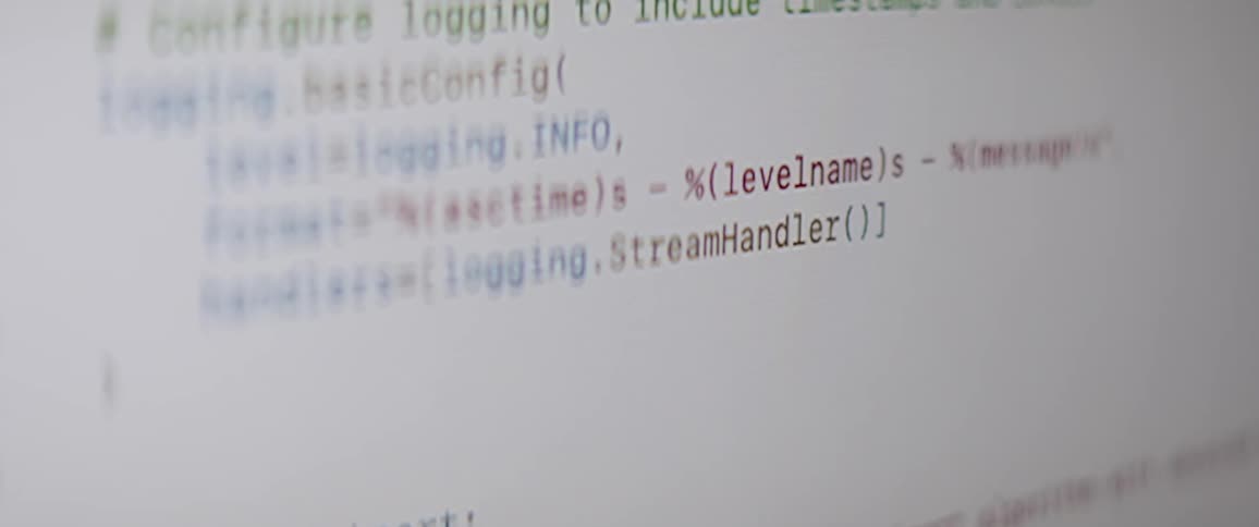 Computer screen displaying python code for configuring logs