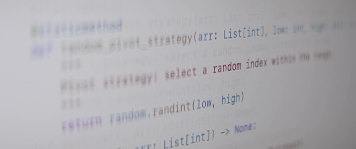 Computer code written on a white screen with several lines focused on pivot strategies and quick sort algorithms