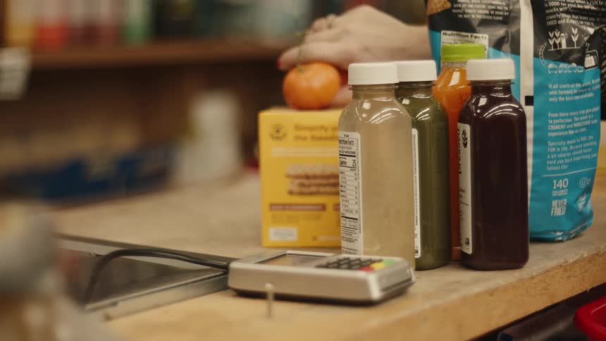 A customer is purchasing groceries