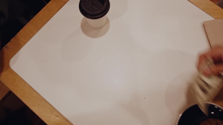 People pay for their food and drinks and get up