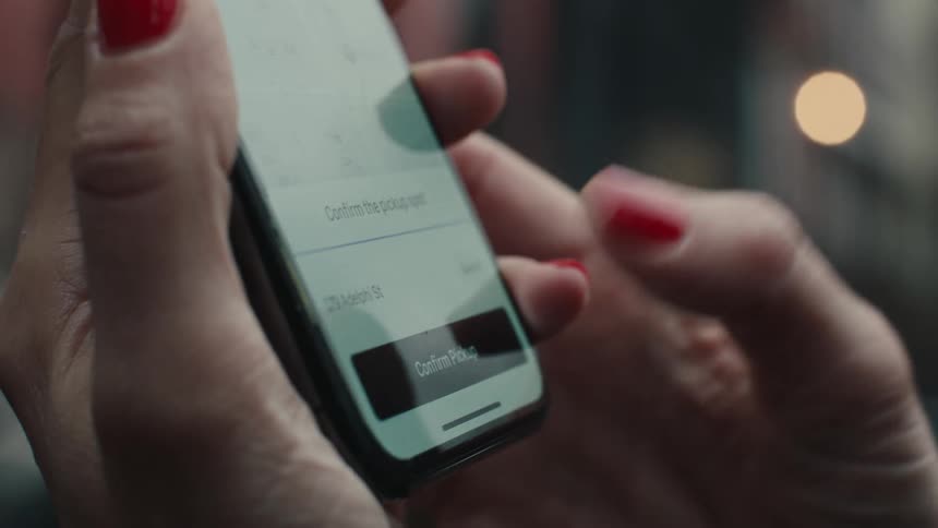 Finger clicking on a smartphone screen
