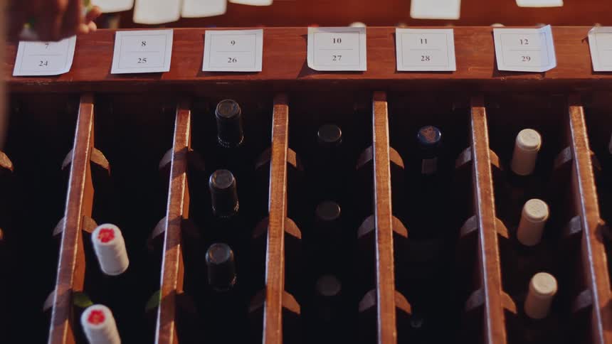 A customer is shopping for wine