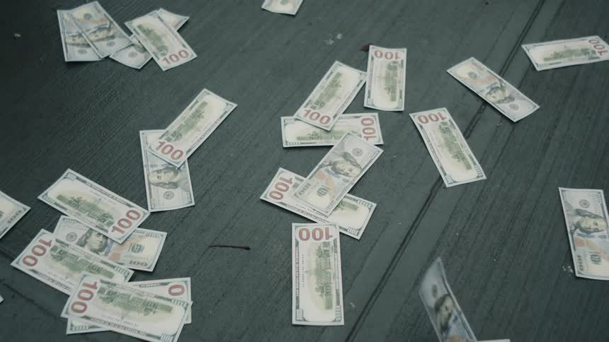 Dollar bills fallen on the floor
