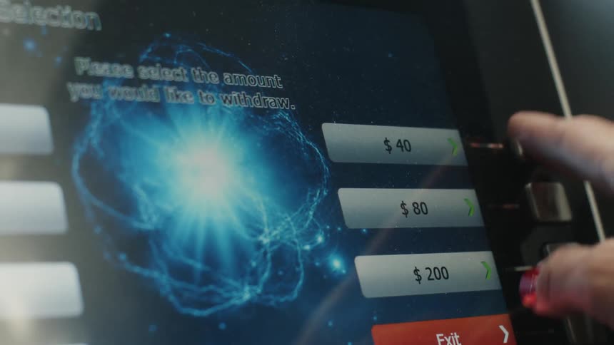 Atm screen displays options while a person presses a side button