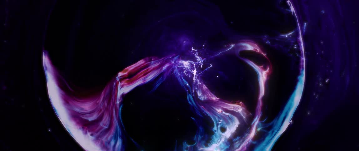 Abstract undulating pattern of violet colored liquid