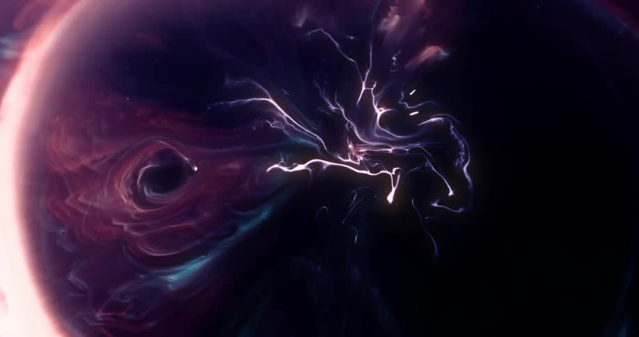 Abstract mixing of colored liquids forms fluid patterns with shades of black blue pink and white