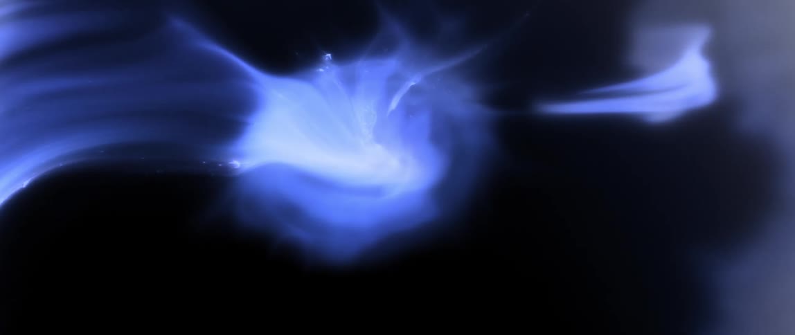 Abstract black ribbon expanding on a light blue background
