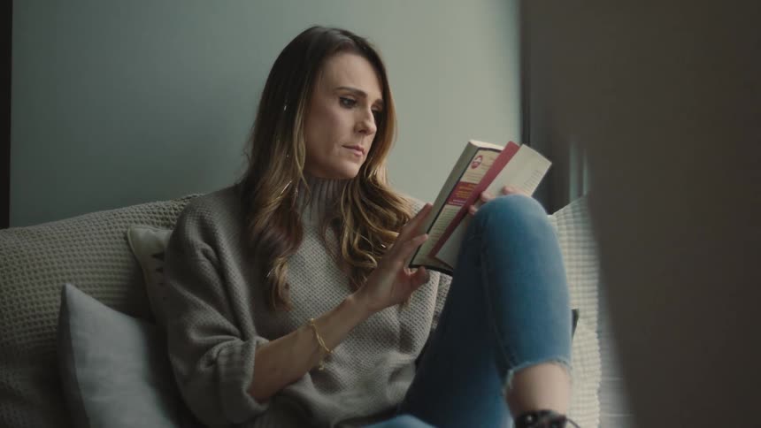Woman sitting reading a book