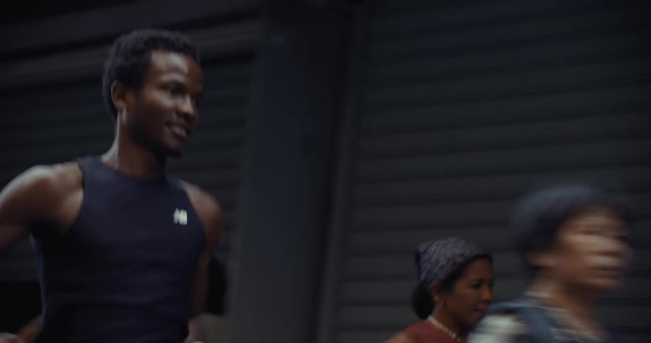 A footage of a male and a female running