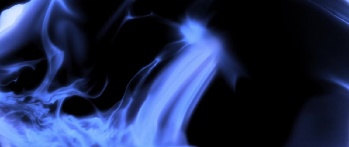 An abstract pattern of swirling blue and black shapes resembling a fluid or smokelike texture with intricate flowing lines and gradients